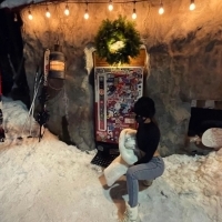 NISEKO BAR in Niseko, Hokkaido, drinking in a dark cabin and watching the snow o