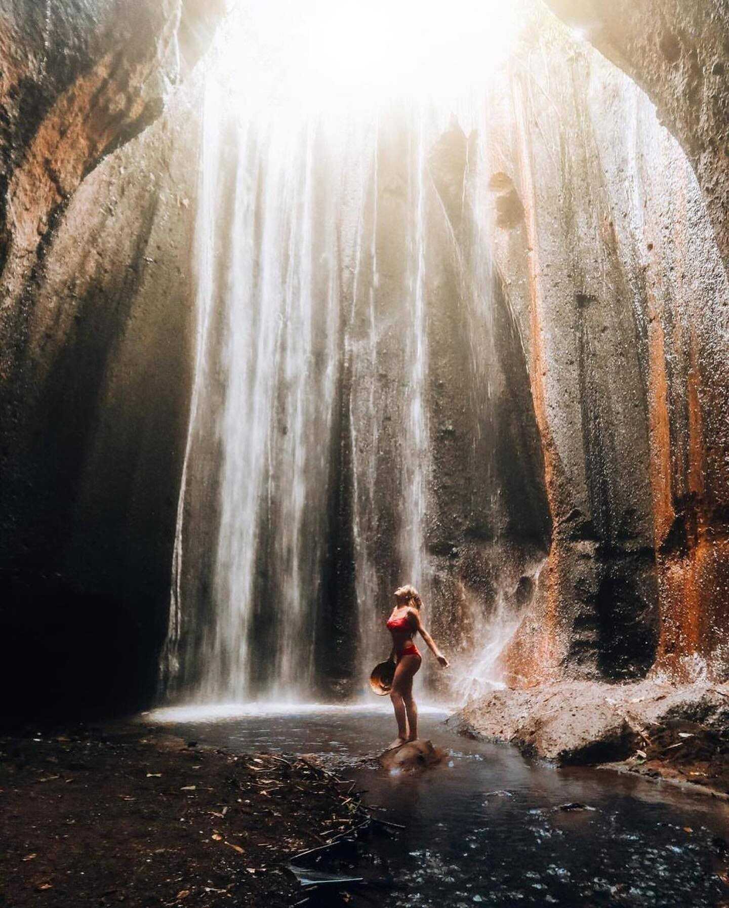 Bali-Get lost in the stunning beauty of Tukad Cepung Waterfall, where nature's magic unfolds