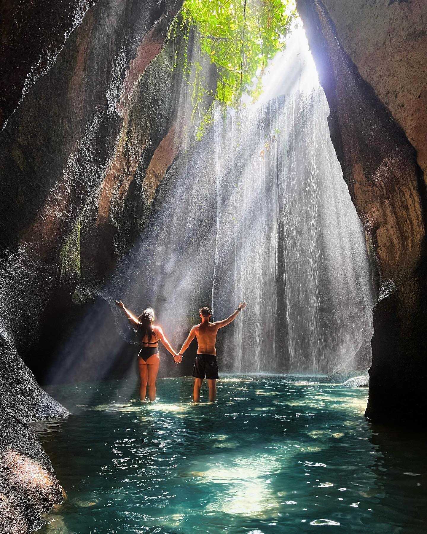 Bali-Get lost in the stunning beauty of Tukad Cepung Waterfall, where nature's magic unfolds