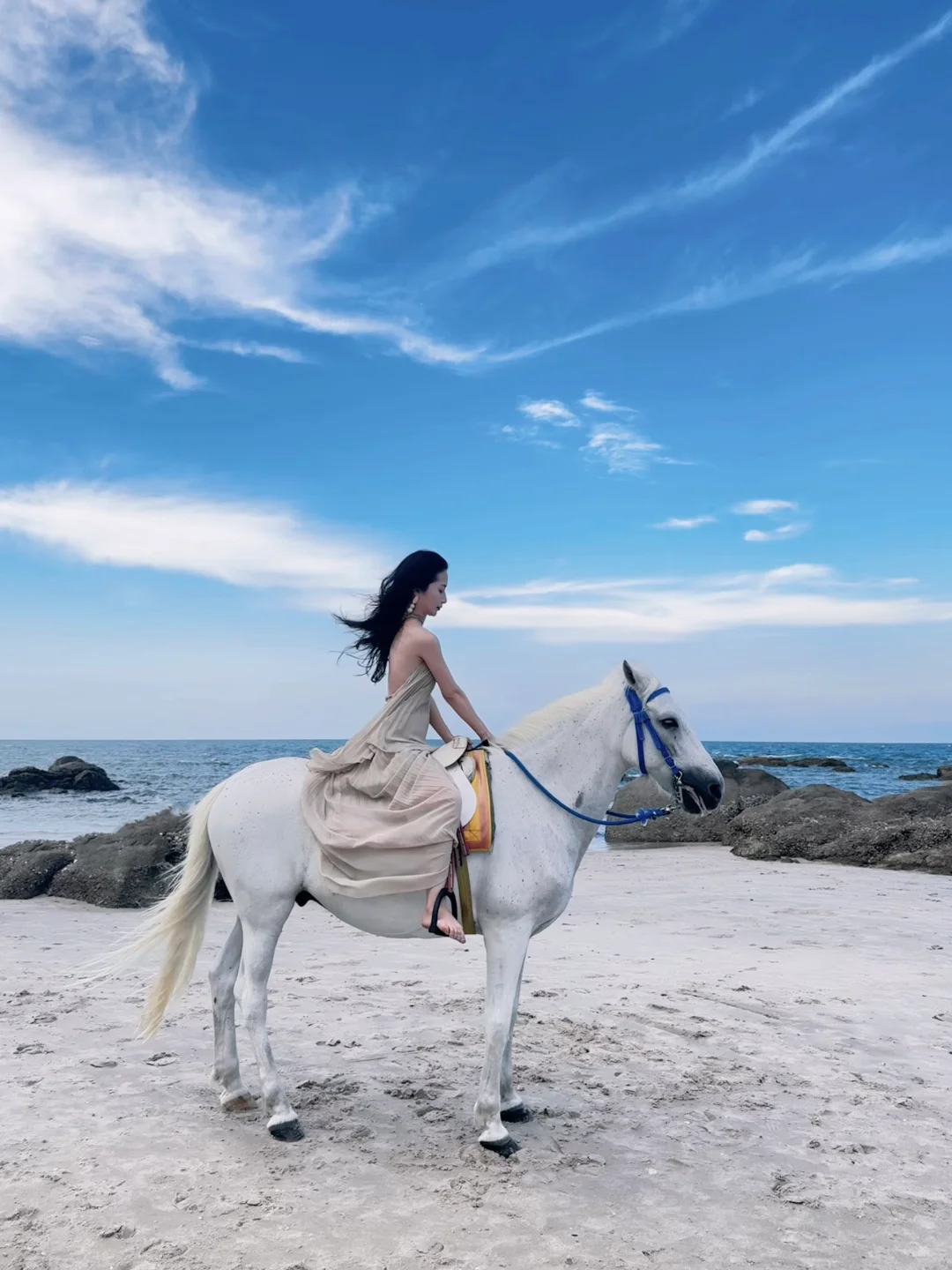 Hua Hin-Girls riding horses on Hua Hin Beach, must choose tall white