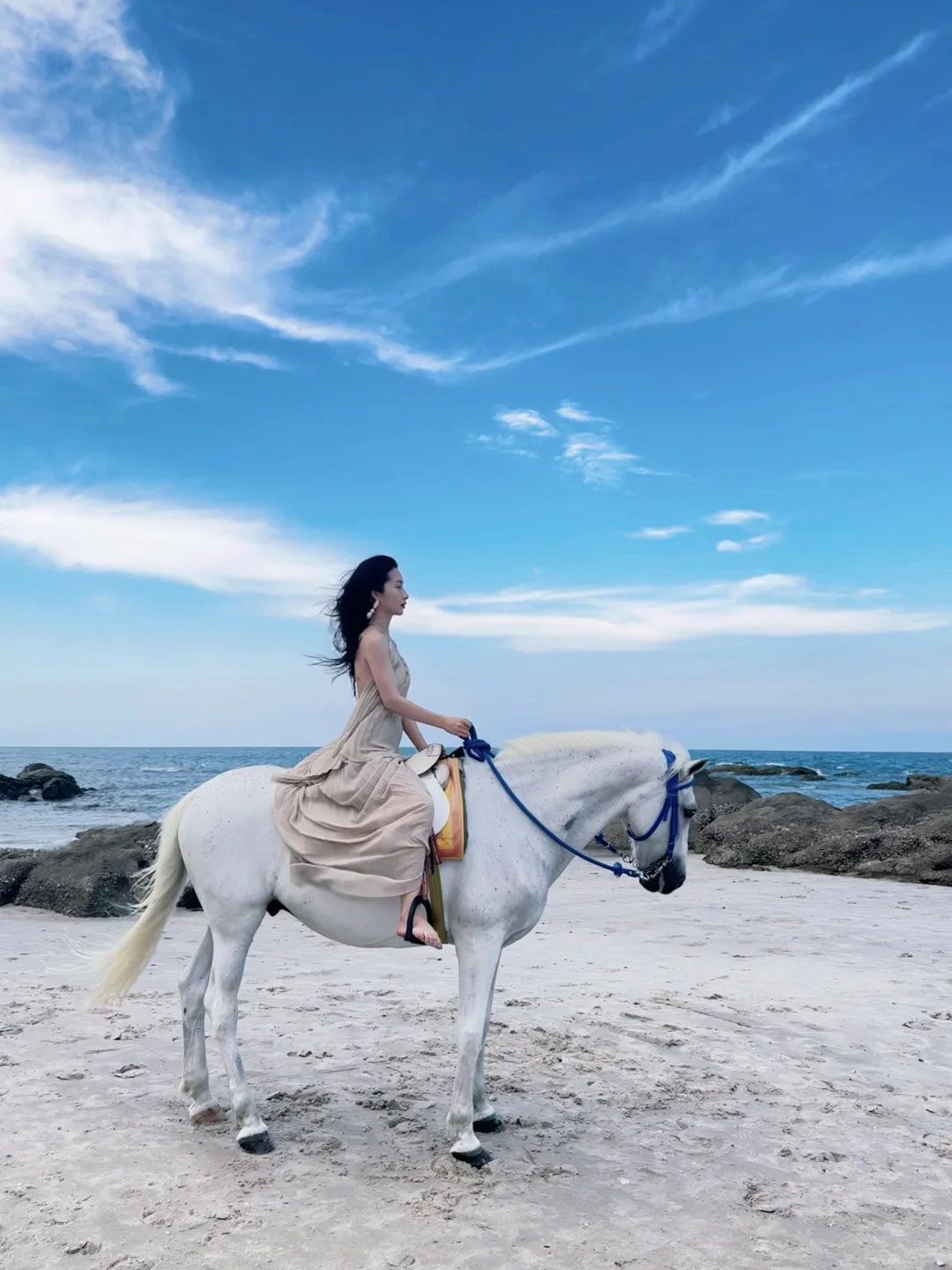 Hua Hin-Girls riding horses on Hua Hin Beach, must choose tall white