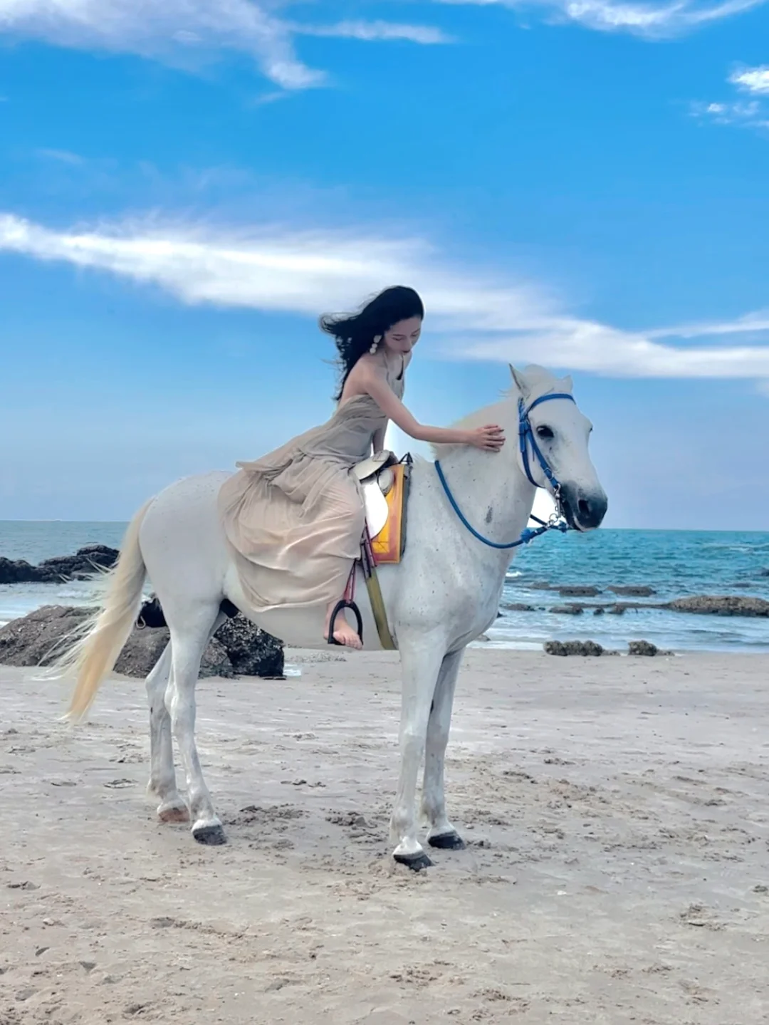 Hua Hin-Girls riding horses on Hua Hin Beach, must choose tall white