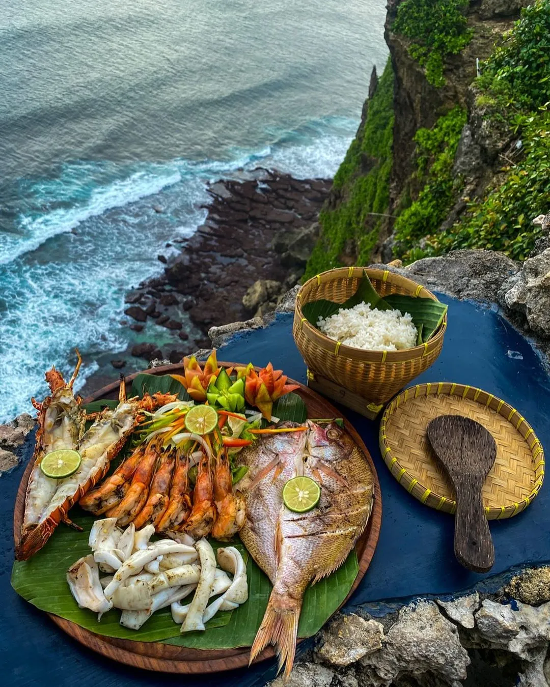 Bali-Malini Uluwatu, Bali cliff sunset seafood restaurant eat seafood BBQ