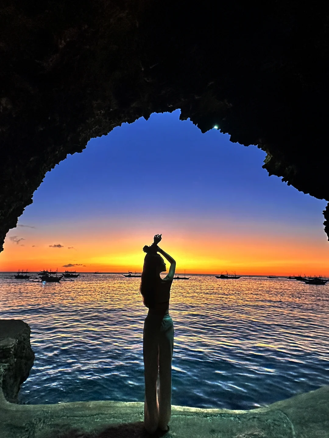 Boracay-Lambros Point, a small cave shooting point, orange tenderness at sunset