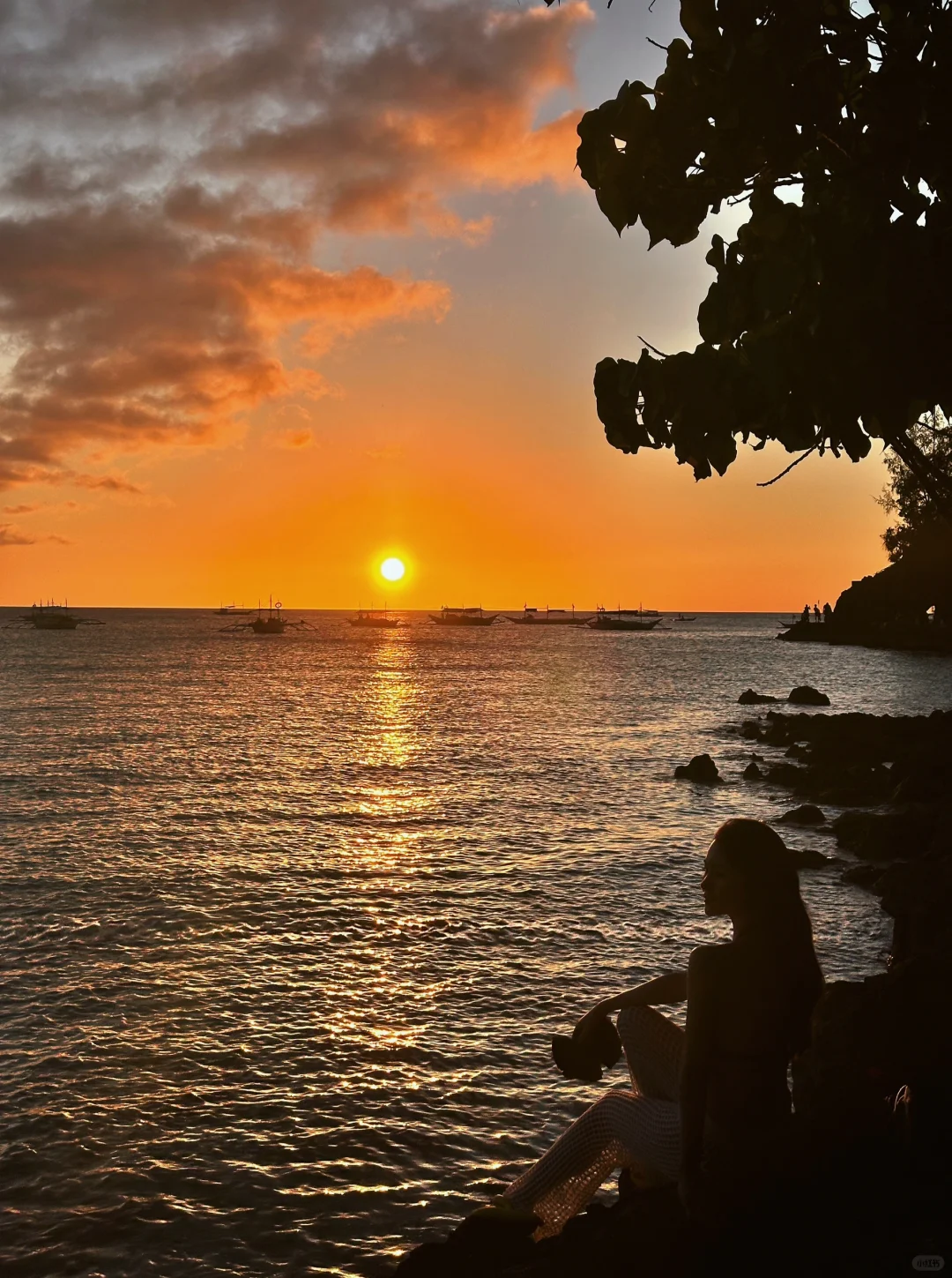 Boracay-Lambros Point, a small cave shooting point, orange tenderness at sunset