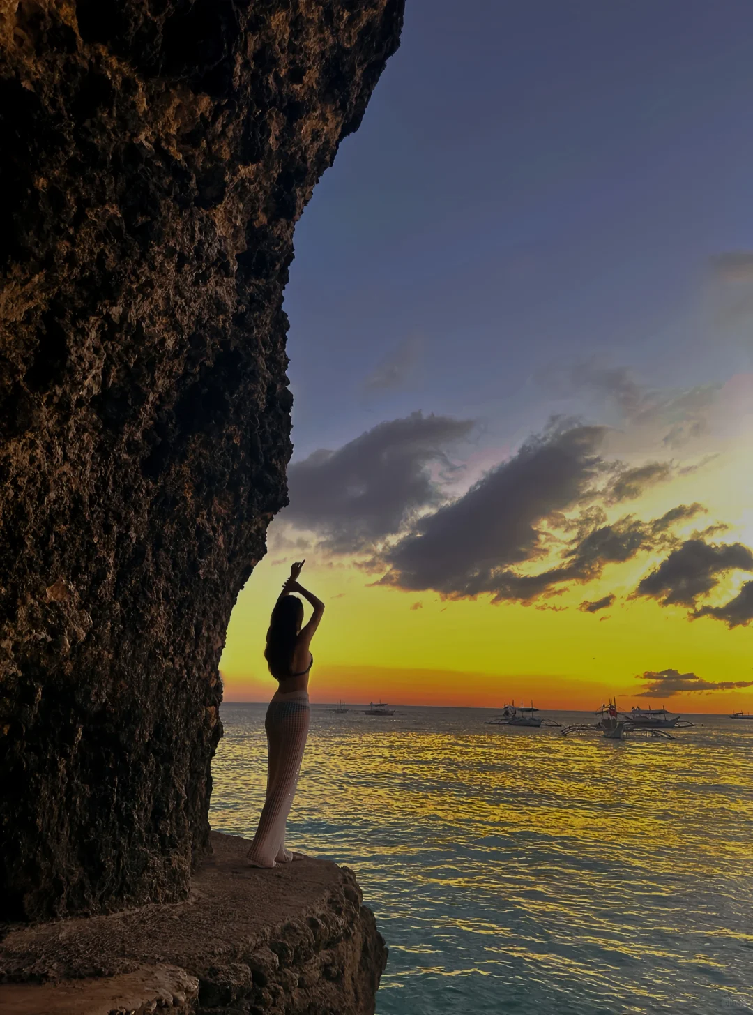 Boracay-Lambros Point, a small cave shooting point, orange tenderness at sunset