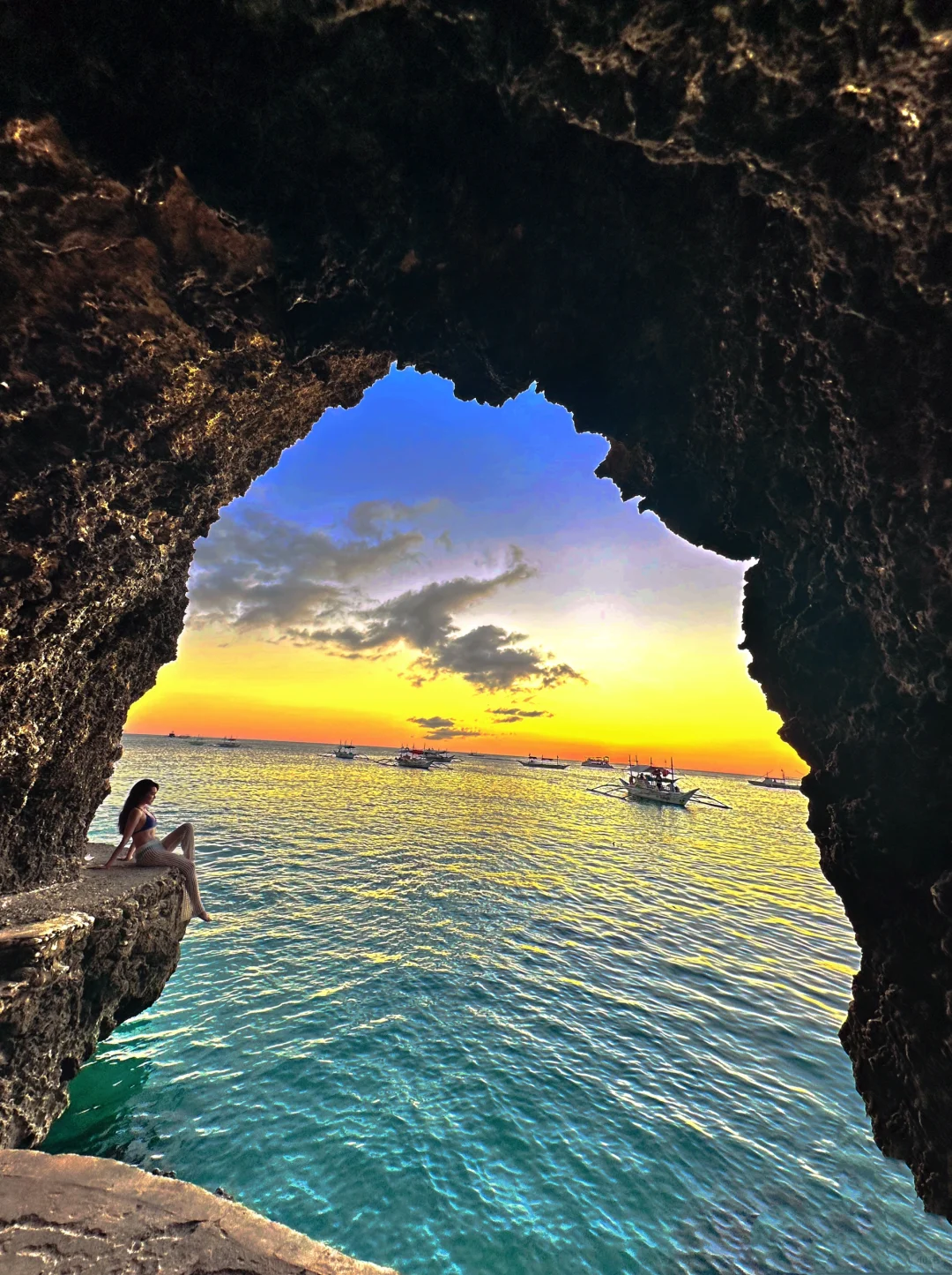 Boracay-Lambros Point, a small cave shooting point, orange tenderness at sunset