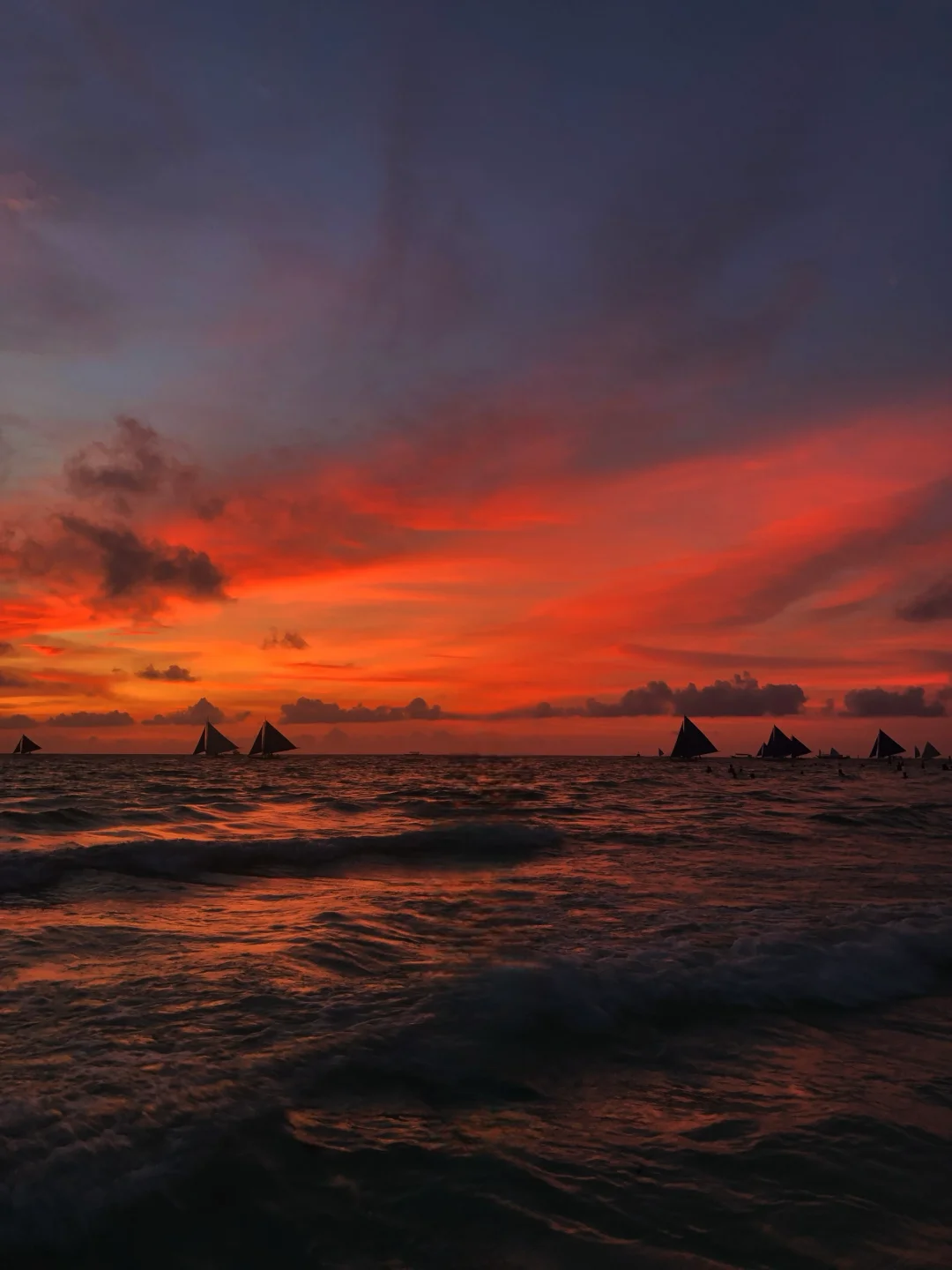 Boracay-Lambros Point, a small cave shooting point, orange tenderness at sunset