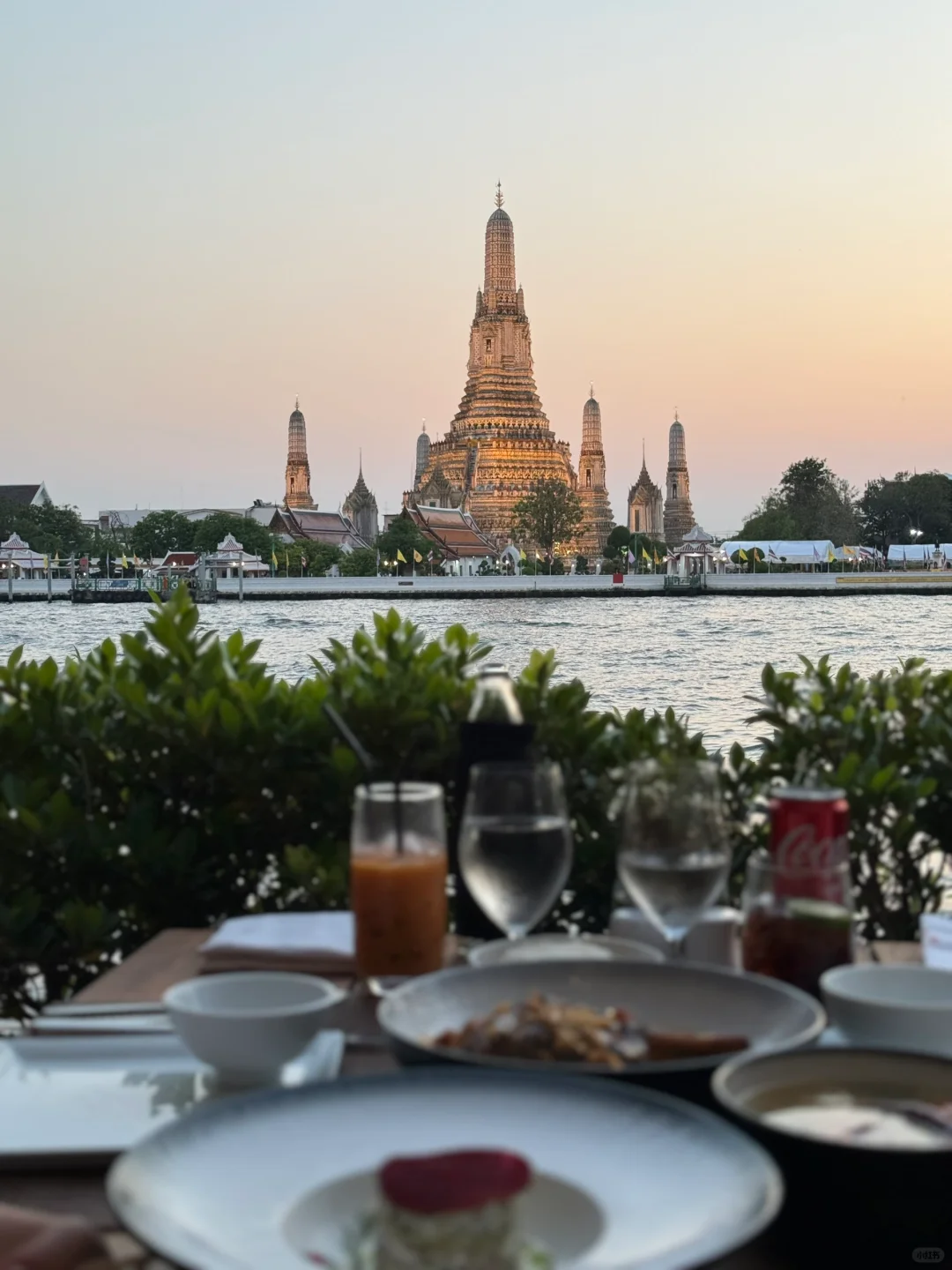 Bangkok-Chao Phraya River sunset at SALA restaurant, Wat Arun in the afterglow of the sunset