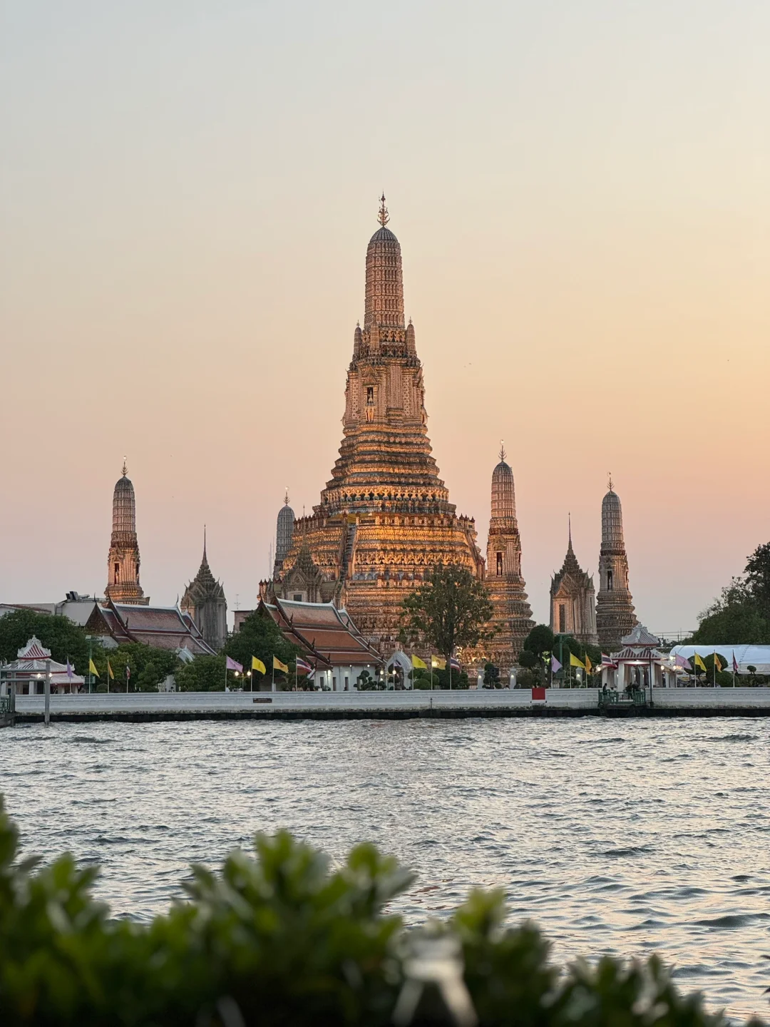 Bangkok-Chao Phraya River sunset at SALA restaurant, Wat Arun in the afterglow of the sunset