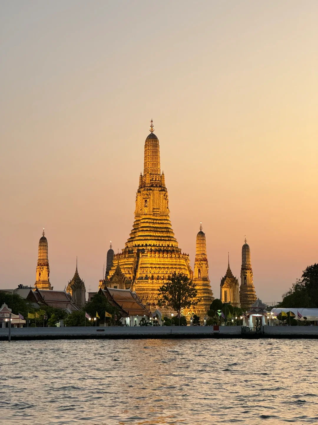 Bangkok-Chao Phraya River sunset at SALA restaurant, Wat Arun in the afterglow of the sunset