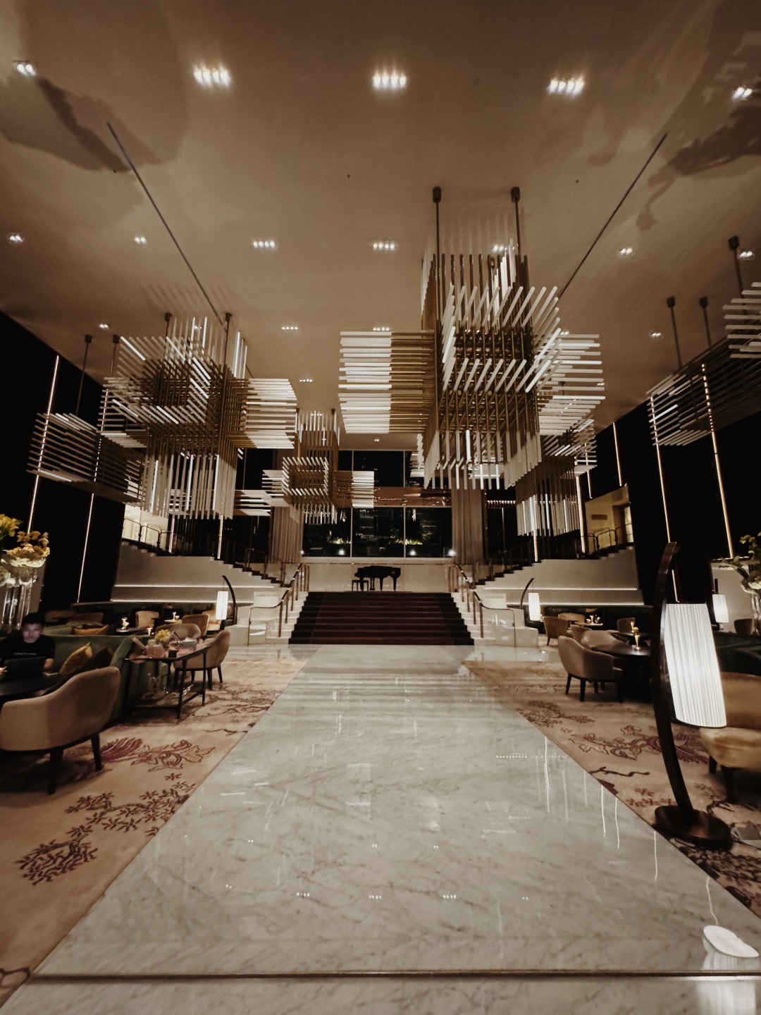 Jakarta-St. Regis Jakarta Hotel, with live piano music in the lobby at night