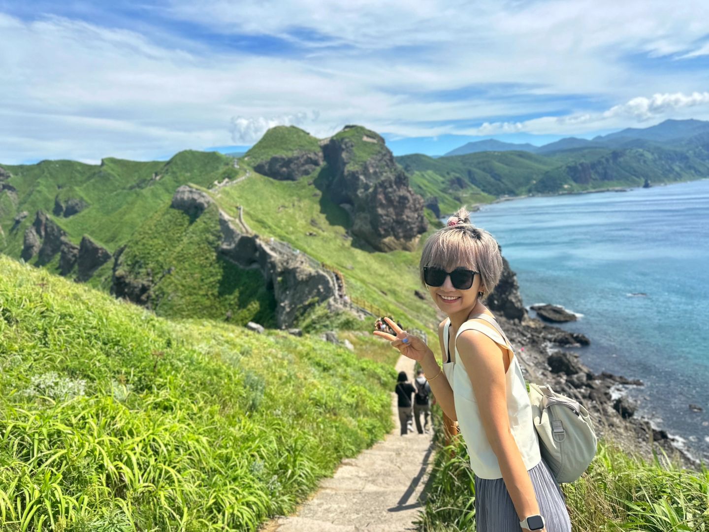 Sapporo/Hokkaido-Summer is the right way to start your trip to Hokkaido💕, with green grass and blue sea