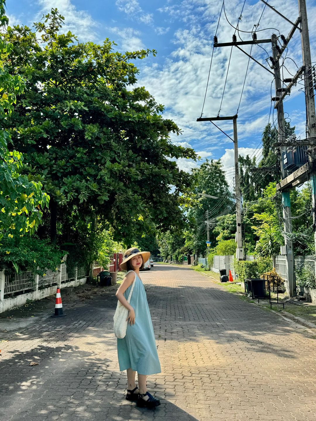 Chiang Mai-Slow life in Chiang Mai, Thailand, shopping at the Coconut Grove Market, feeding pigeons at Thapae Gate