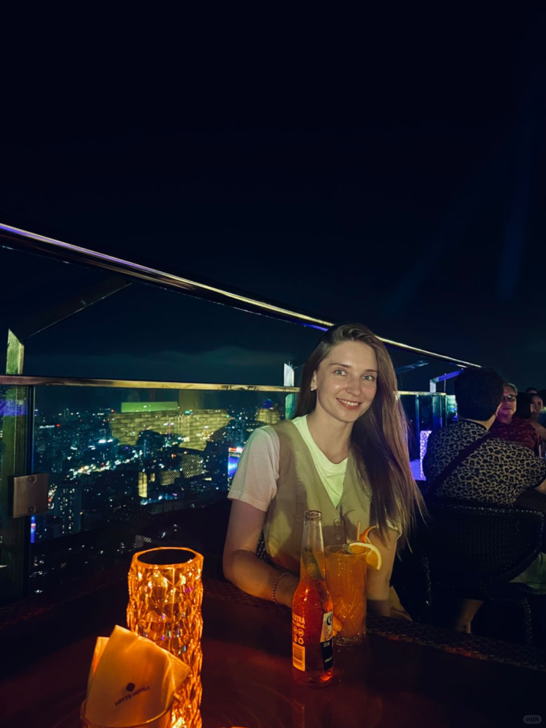 Hanoi-Top Of Hanoi Bar, the highest sky-high open-air bar in Hanoi, 2 girls drinking together