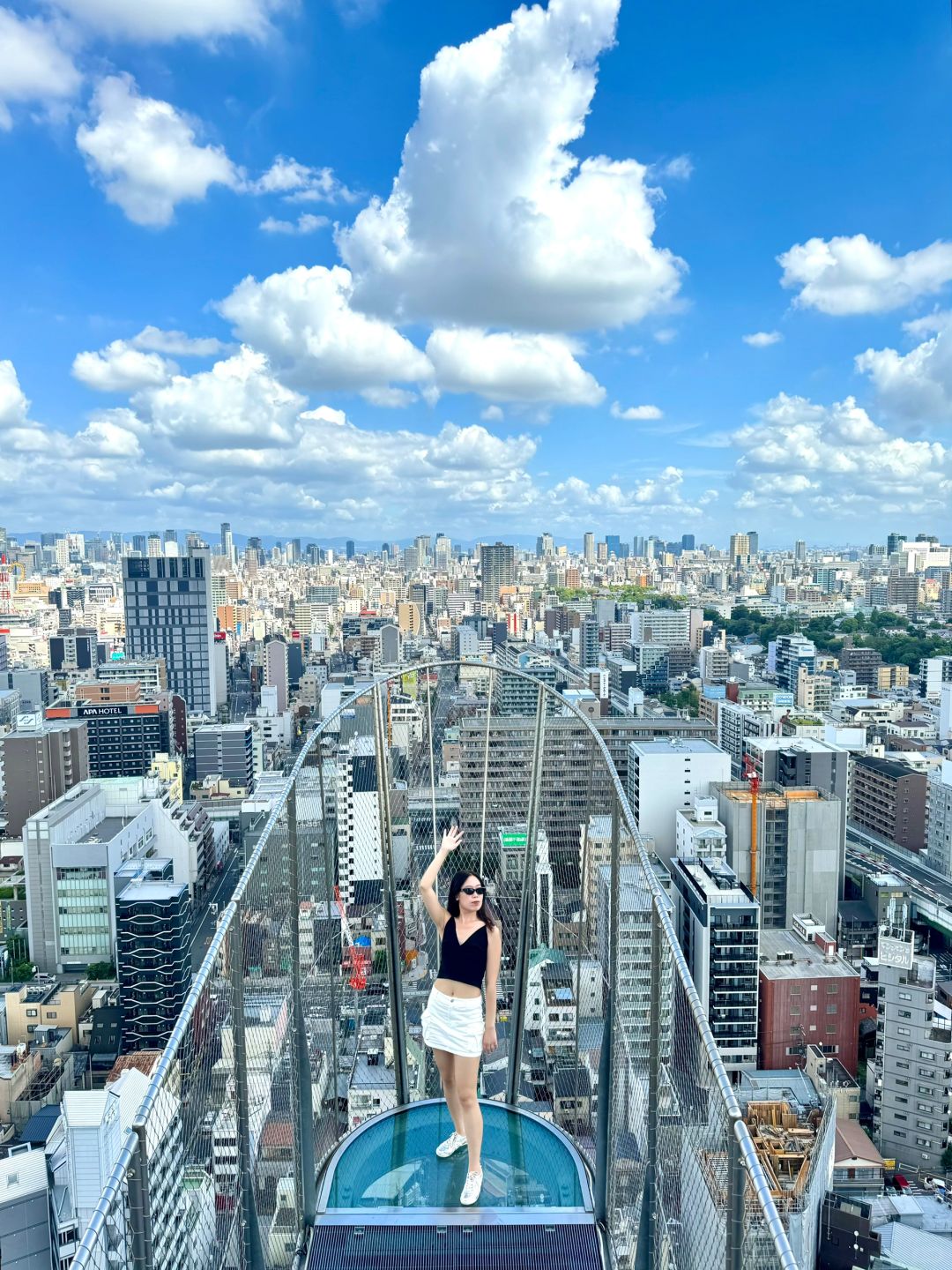 Osaka-Osaka, Japan, Tongtian Pavilion viewing platform landscape, blue sky and white clouds