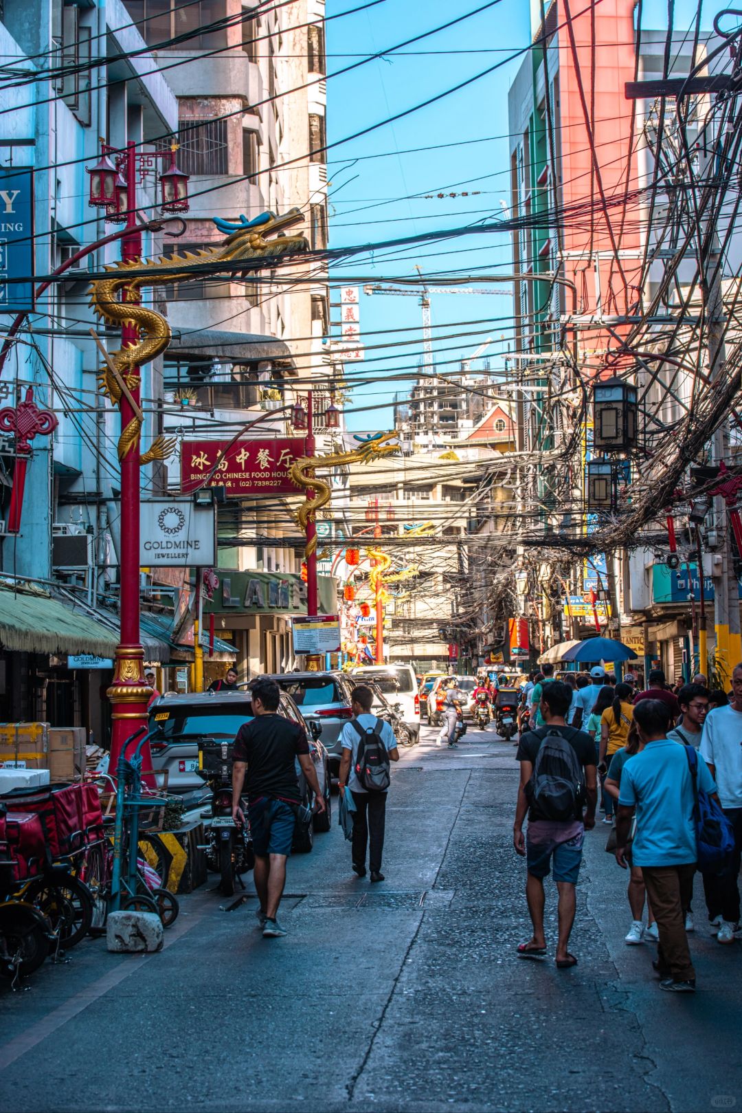 Manila/Luzon-Visiting Chinatown in Manila, Philippines. Noisy, messy, lively, crowded. Very lively