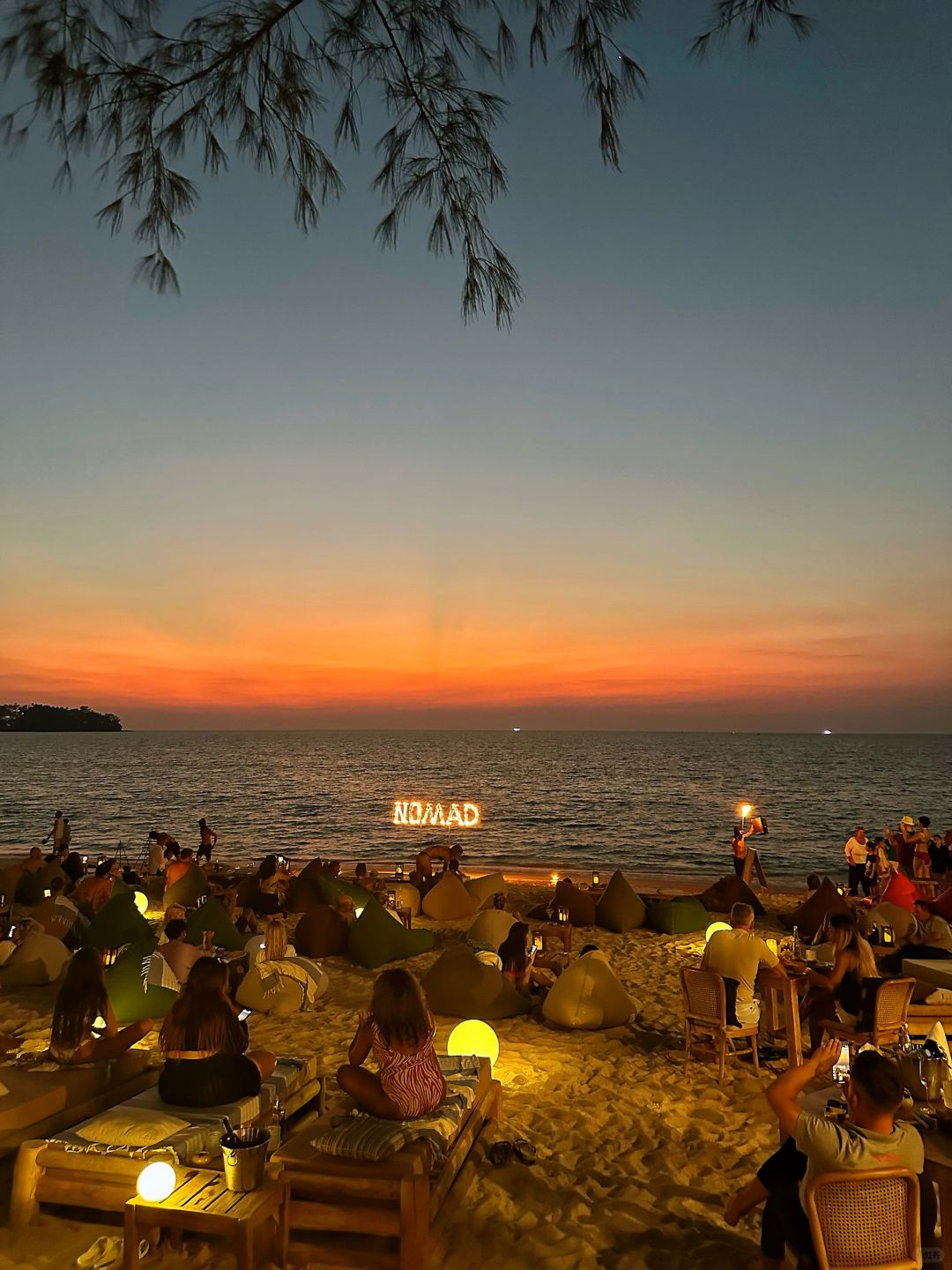 Phuket-Nomad Beach Club, a bohemian bar in Phuket, where you can relax on the lazy sofa