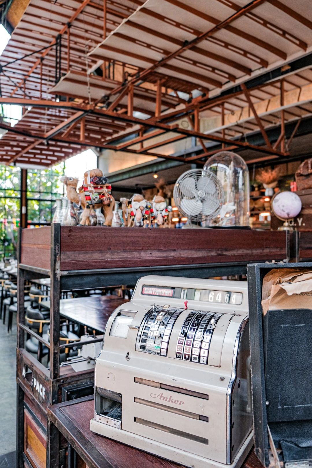 Hua Hin-Air Space, warehouse-style coffee shop in Hua Hin, has a leather world map made in 1903