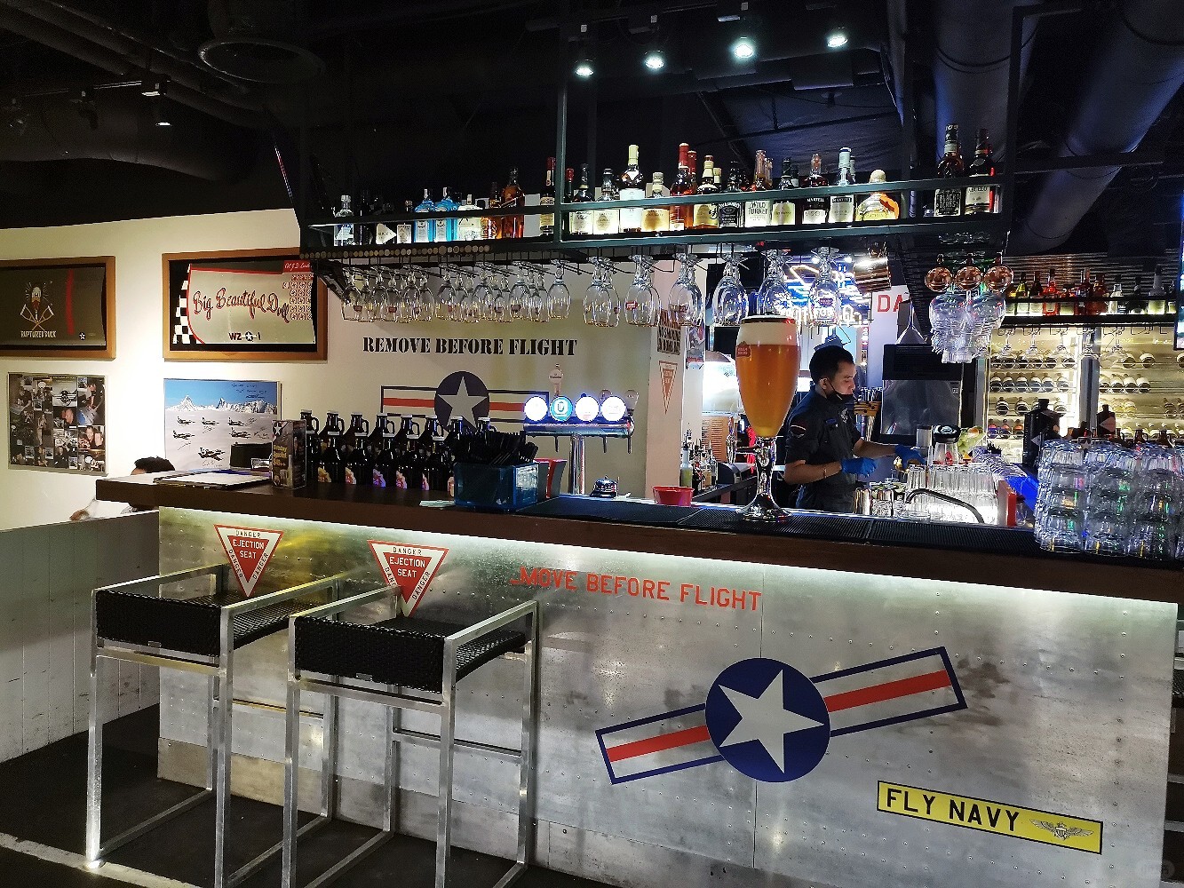 Clark/Angel City-Clark Wings bar, with an airplane logo at the door, offers a wide variety of cocktails and beers