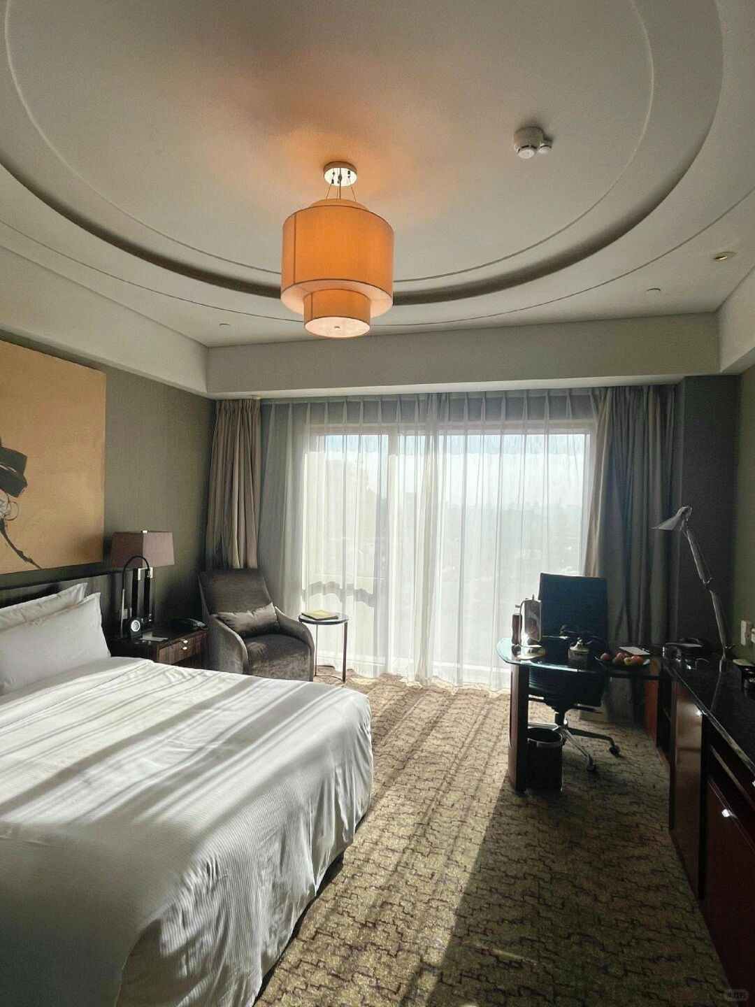 Beijing/Tianjin-The Regent Beijing Hotel has french window windows in every room. You can enjoy the bustling downtown of Beijing! 双语对照 笔记