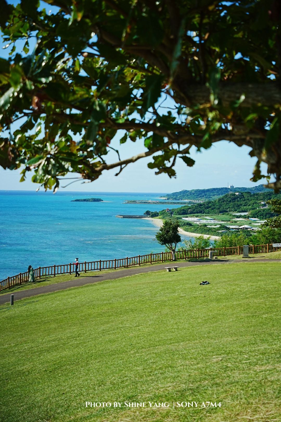 Okinawa-Beautiful Chinian Cape with turbulent waves and the distant sheep