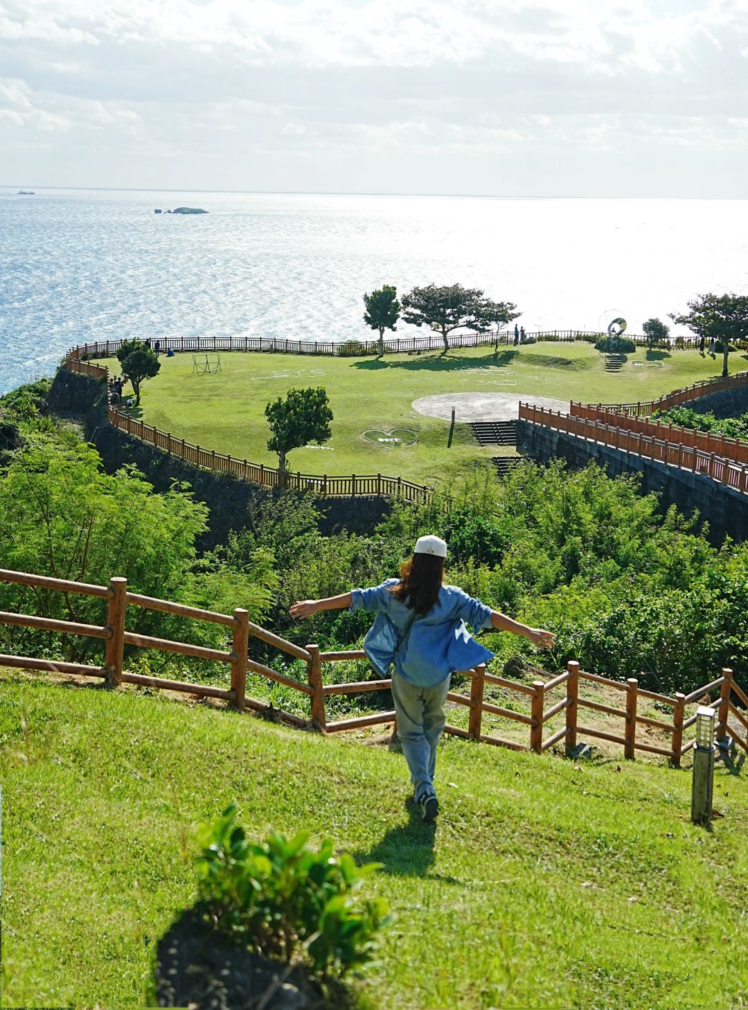 Okinawa-Beautiful Chinian Cape with turbulent waves and the distant sheep