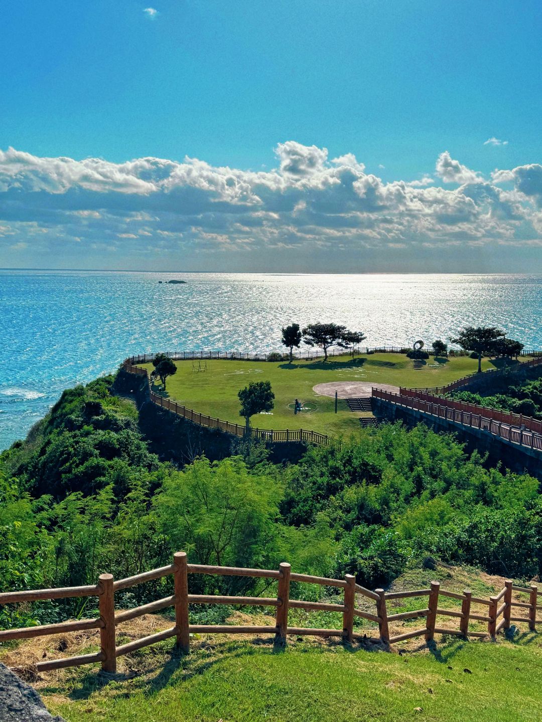 Okinawa-Beautiful Chinian Cape with turbulent waves and the distant sheep