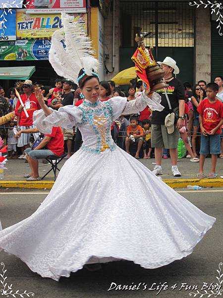 Cebu-Locals dance with the statue of the Holy Infant during the Sinulog Festival in Cebu