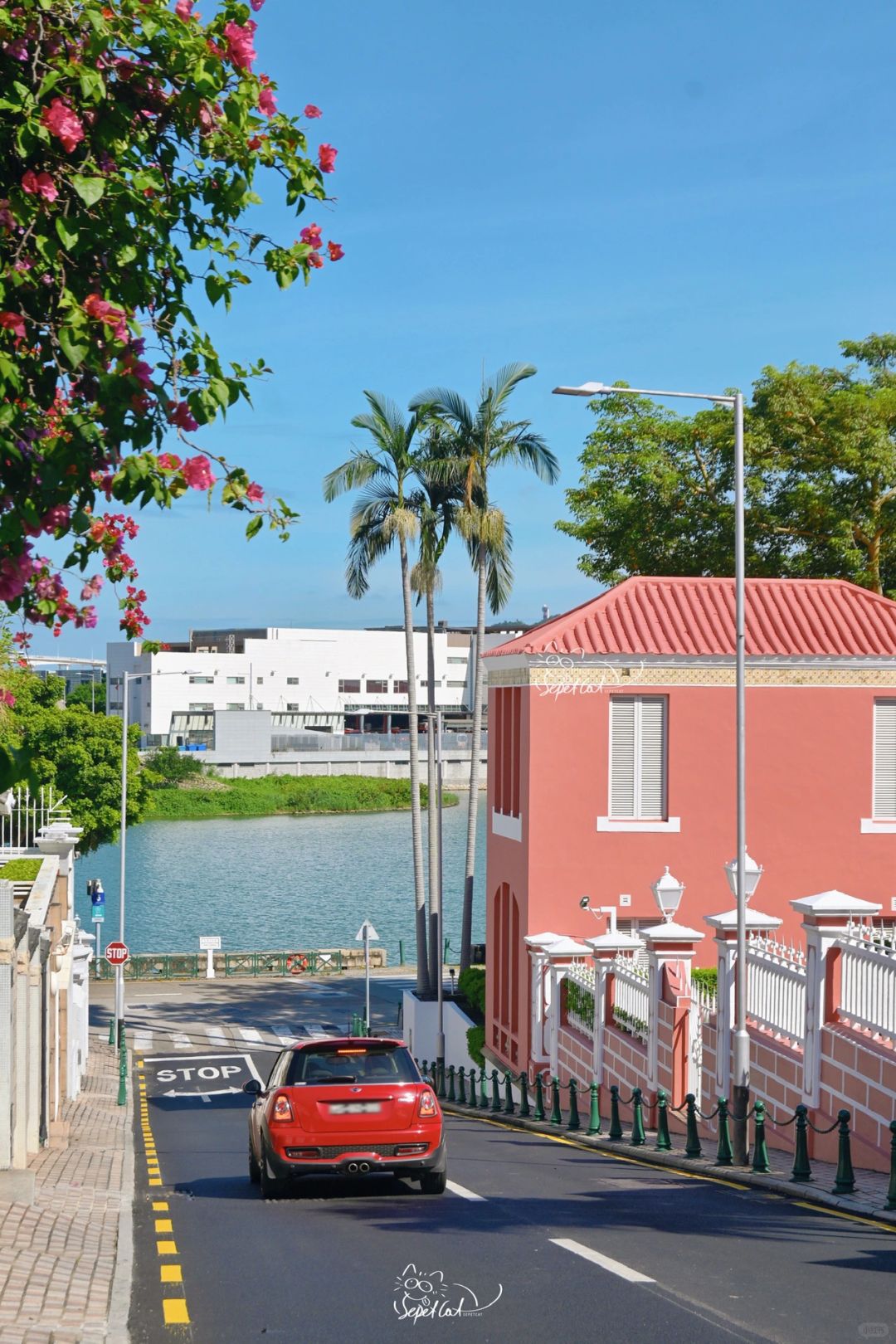 Macao-City Walk in Yiwan Alley, Macau Peninsula, Fairytale path leading to a pink house by the sea