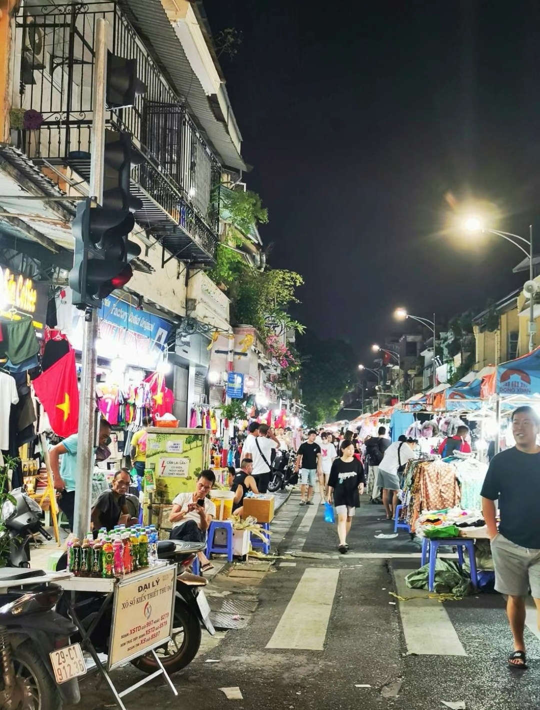 Hanoi-Hoan Kiem Lake area in Hanoi, Vietnam. Night market, food, bars, spas are all available