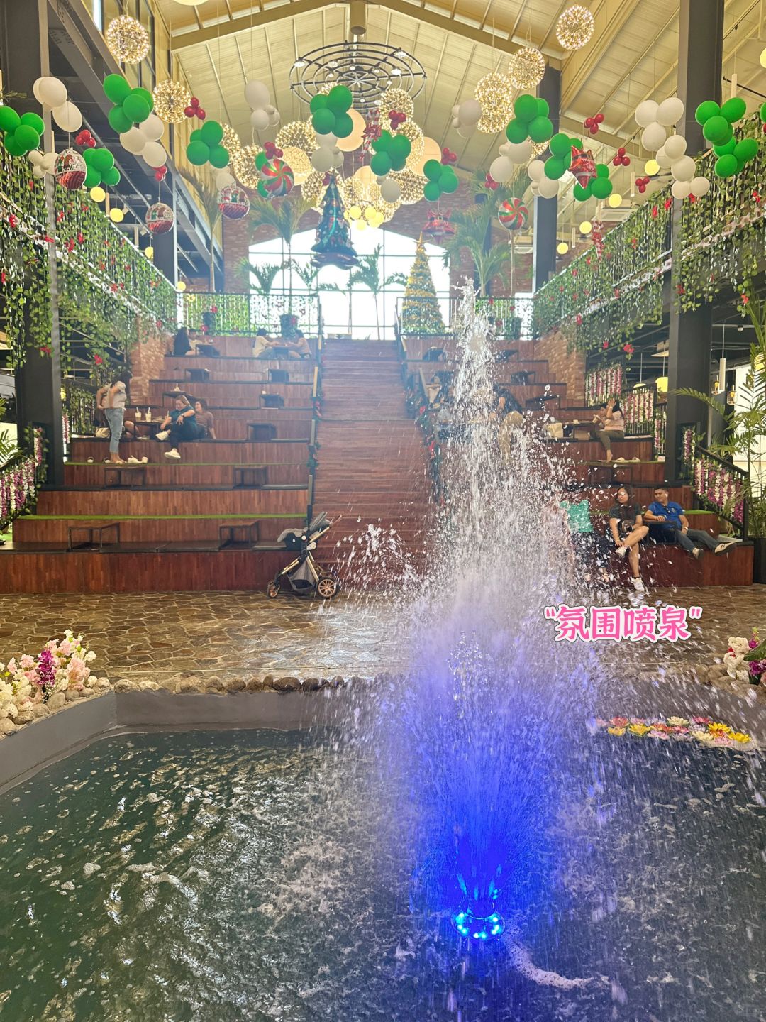 Clark/Angel City-Lala Garden Cafe, industrial style, with atmospheric fountains and colorfully lit arch bridges