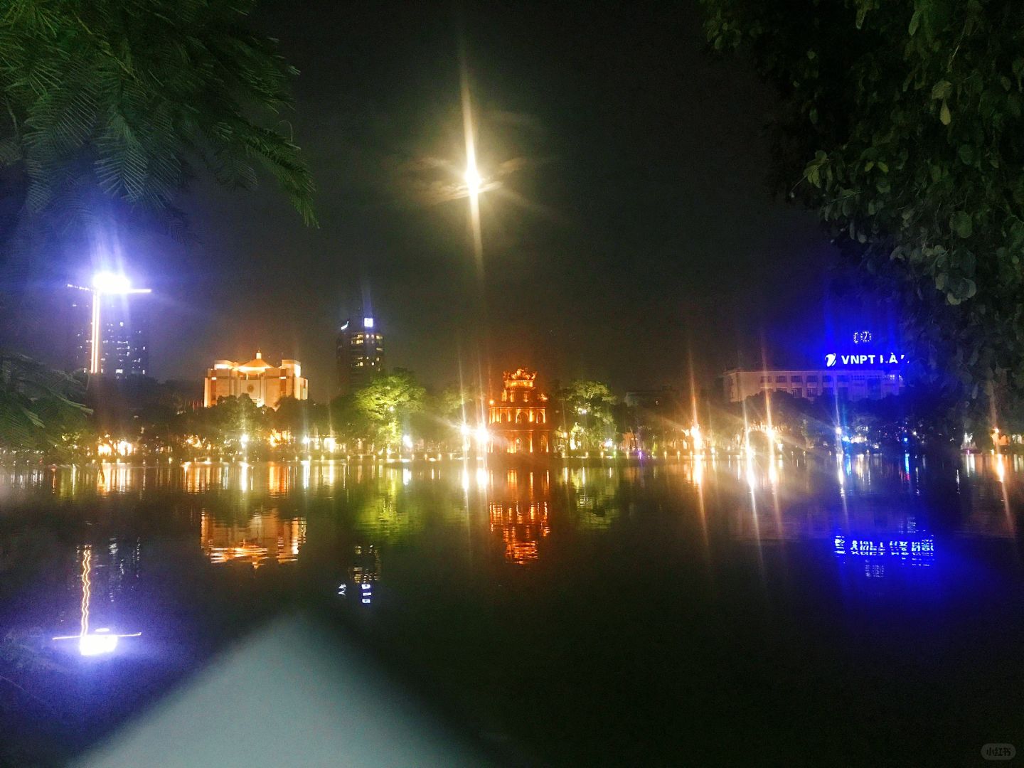 Hanoi-Hoan Kiem Lake Park in Hanoi, Vietnam, the lake is as clear mirror and the trees are lush