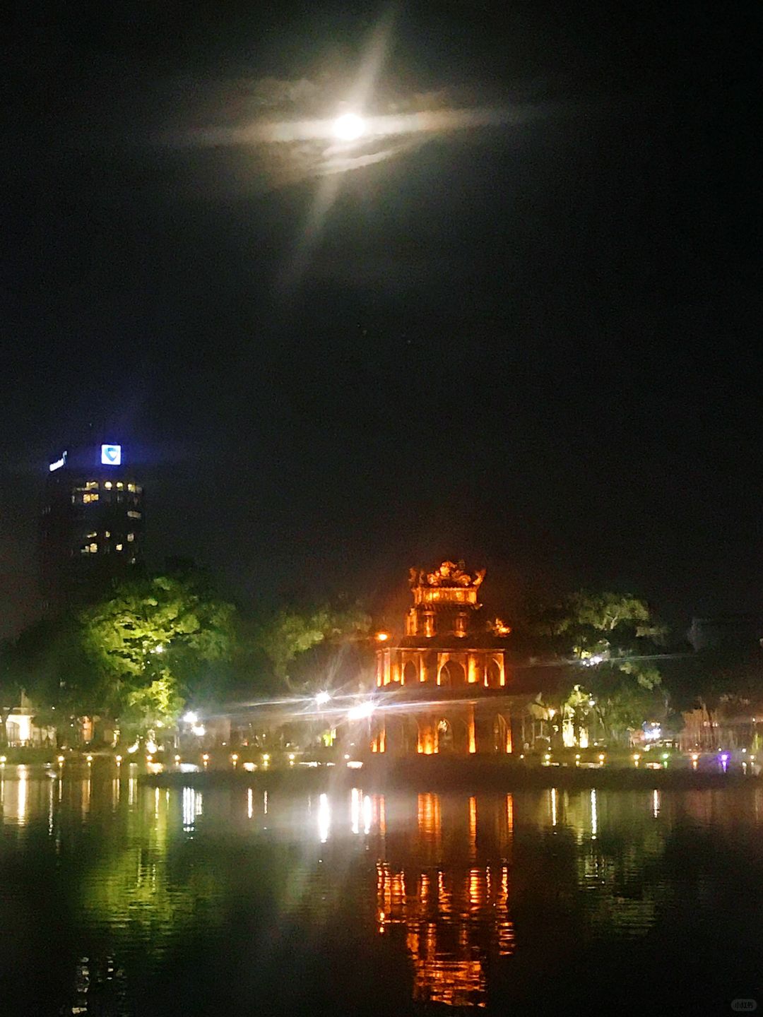 Hanoi-Hoan Kiem Lake Park in Hanoi, Vietnam, the lake is as clear mirror and the trees are lush