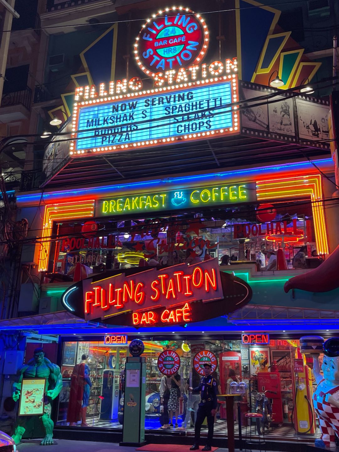 Manila/Luzon-Filling Station Bar Cafe in Manila's red-light district, with many statues of American anime