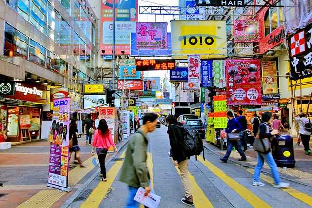 Hong kong-The history and present of Hong Kong's Wan Chai "red light district", with nightclubs and neon lights all over the "brothels"