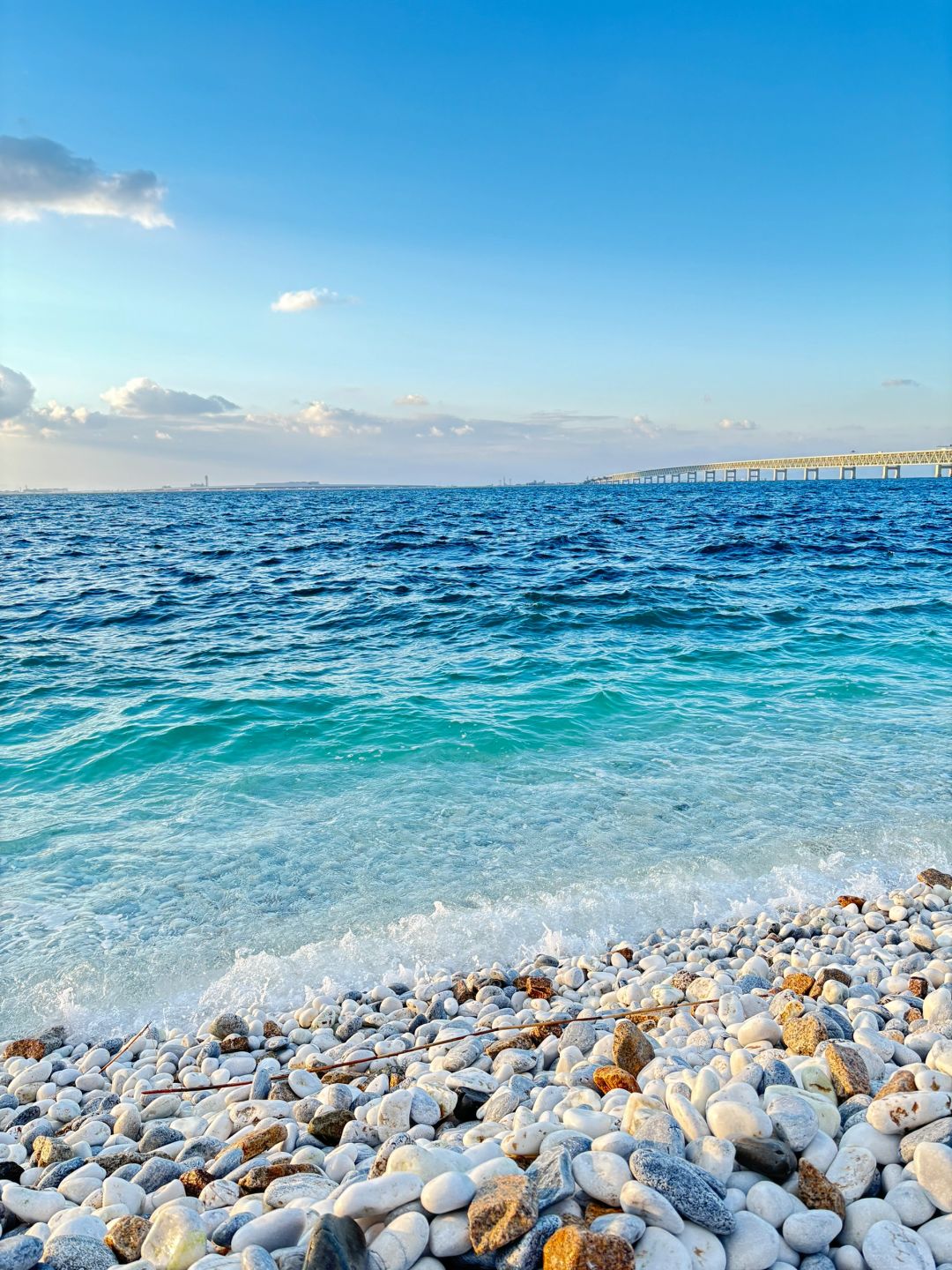 Osaka-Rinku Town is only one subway station away from Kansai Airport, and the jelly-blue sea