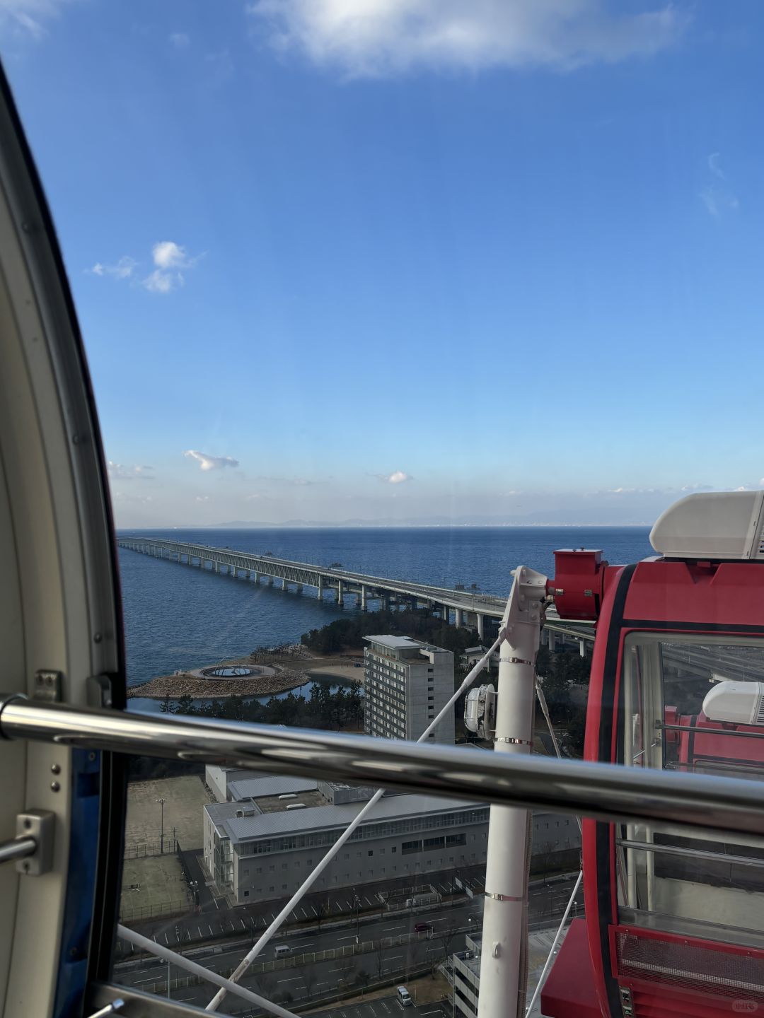 Osaka-Rinku Town is only one subway station away from Kansai Airport, and the jelly-blue sea