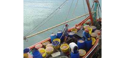 Hua Hin Fishing Pier in Thailand is a favorite of tourists and fishermen