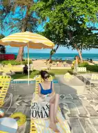 The Standard, Hua Hin?, decorated in lemon yellow, with parasols and beach chairs