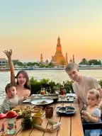 Chao Phraya River sunset at SALA restaurant, Wat Arun in the afterglow of the sunset