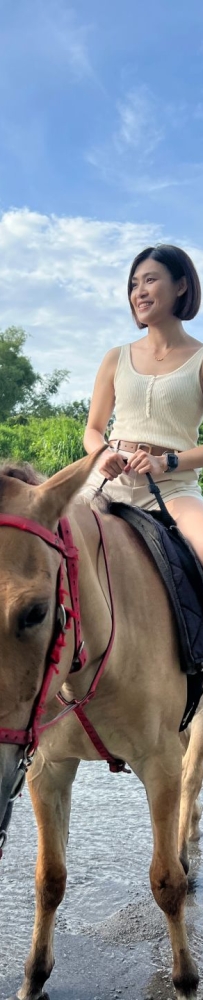 Clark horseback riding experience in the Philippines, walking through rivers and farmland