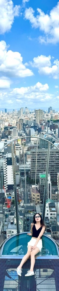 Osaka, Japan, Tongtian Pavilion viewing platform landscape, blue sky and white clouds