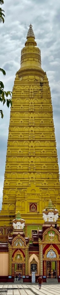 Wat Mahathat Wachiramongkol, Krabi, Thailand, with its gleaming golden pagoda