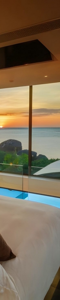 Kata Rocks Resort Hotel, a modern bedroom with a terrace with a private infinity pool