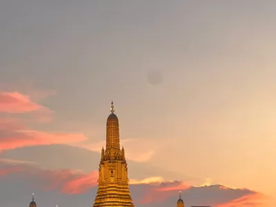 Watch the sunset over the Chao Phraya River from the Grand Palace