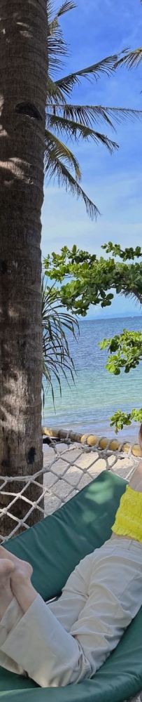 Calma Cafe, a seaside cafe in Boracay, where you can lie in a hammock and bask in the sun