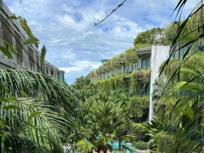 Panwaburi Beachfront Resort Hotel in Phuket, with an outdoor infinity pool on the rooftop